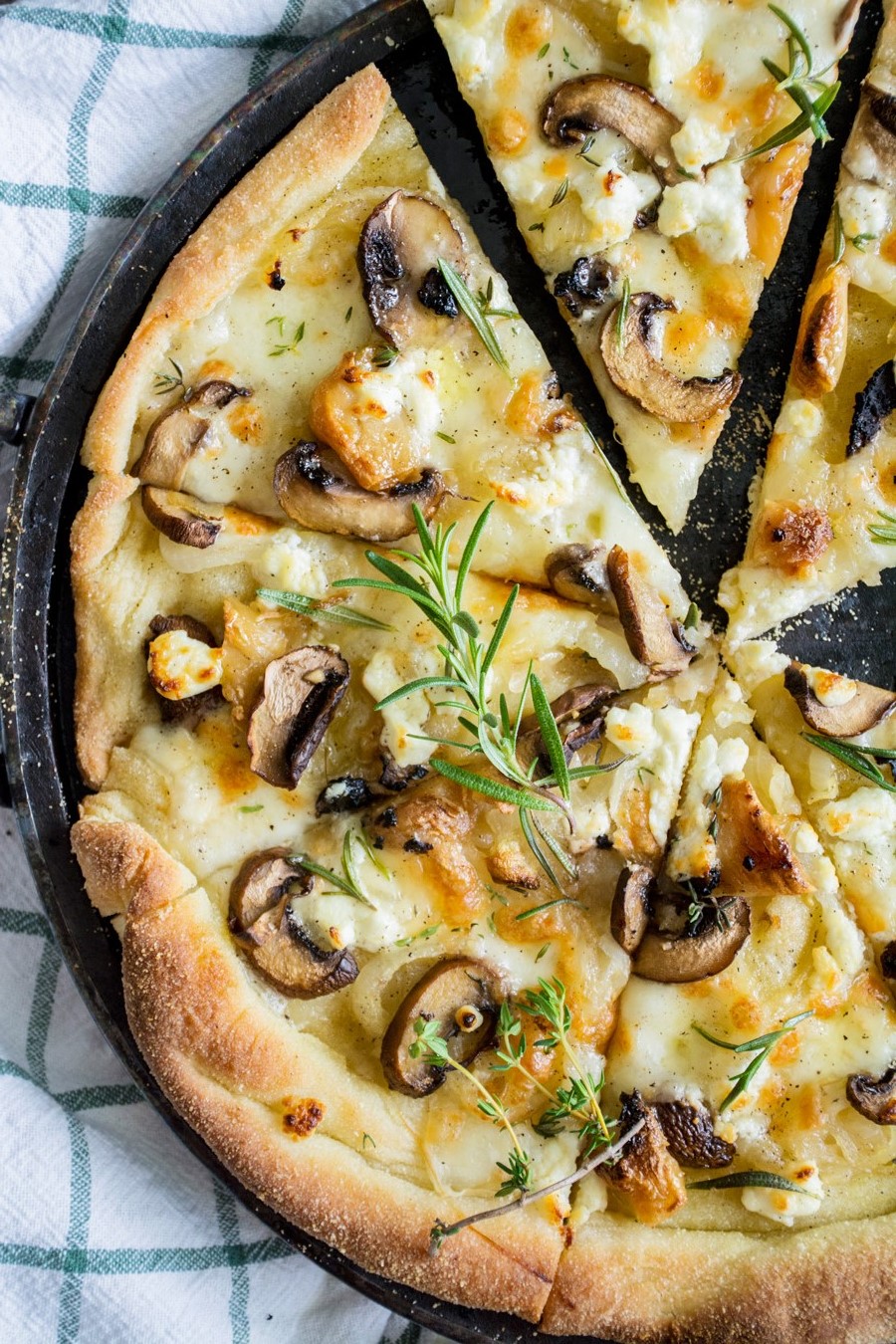 mushroom-pizza-bianco-with-truffle-oil-fresh-herbs